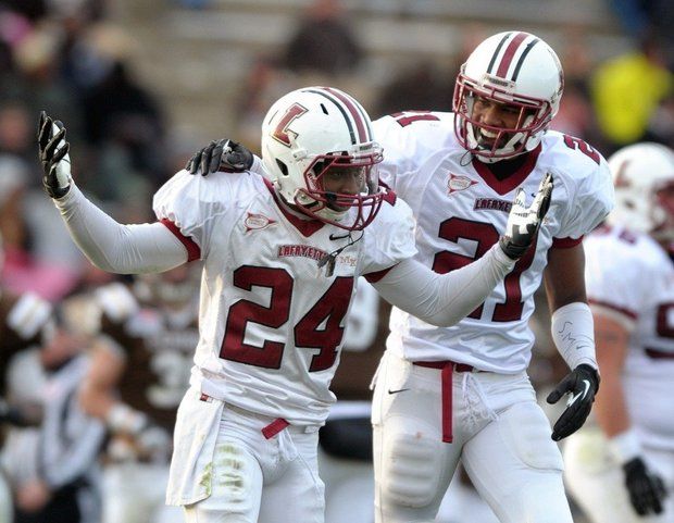 Lafayette defensive back Matt Smalley, #24, reacts after intercepting a pass as teammate DeOliver Davis, #21, stands by in the fourth quarter of their win over rival Lehigh at Goodman Stadium on Nov. 23, 2013. (lehighvalleylive file photo) 