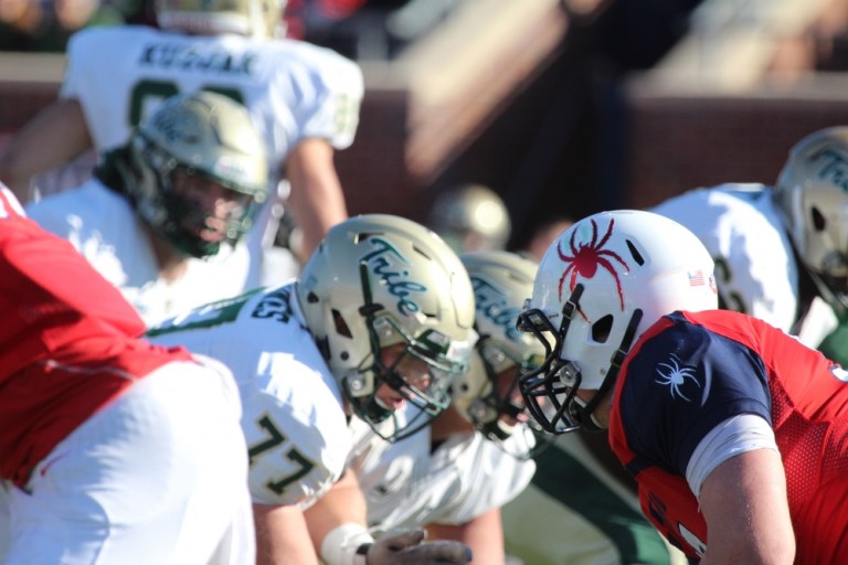 The boys up front will need to win the battle in the trenches on Saturday for the Tribe. [photo: the Collegian]