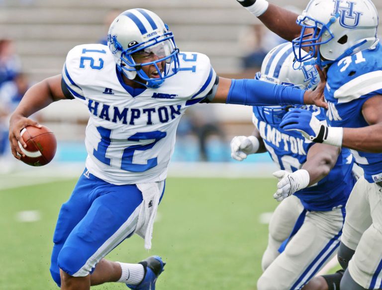 Hampton's QB Jaylian Williamson is no joke, with over a dozen starts under his belt, including one against W&M in 2014. [photo: Aileen Devlin, Virginia Pilot]